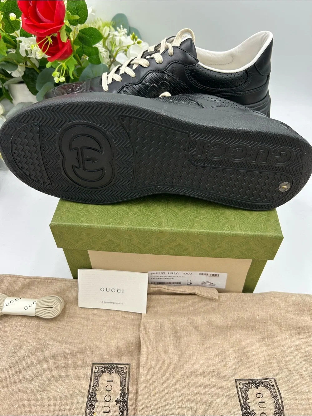 Men's Gucci, GG embossed, black leather sneakers size 11 fits 11.5 made in Italy